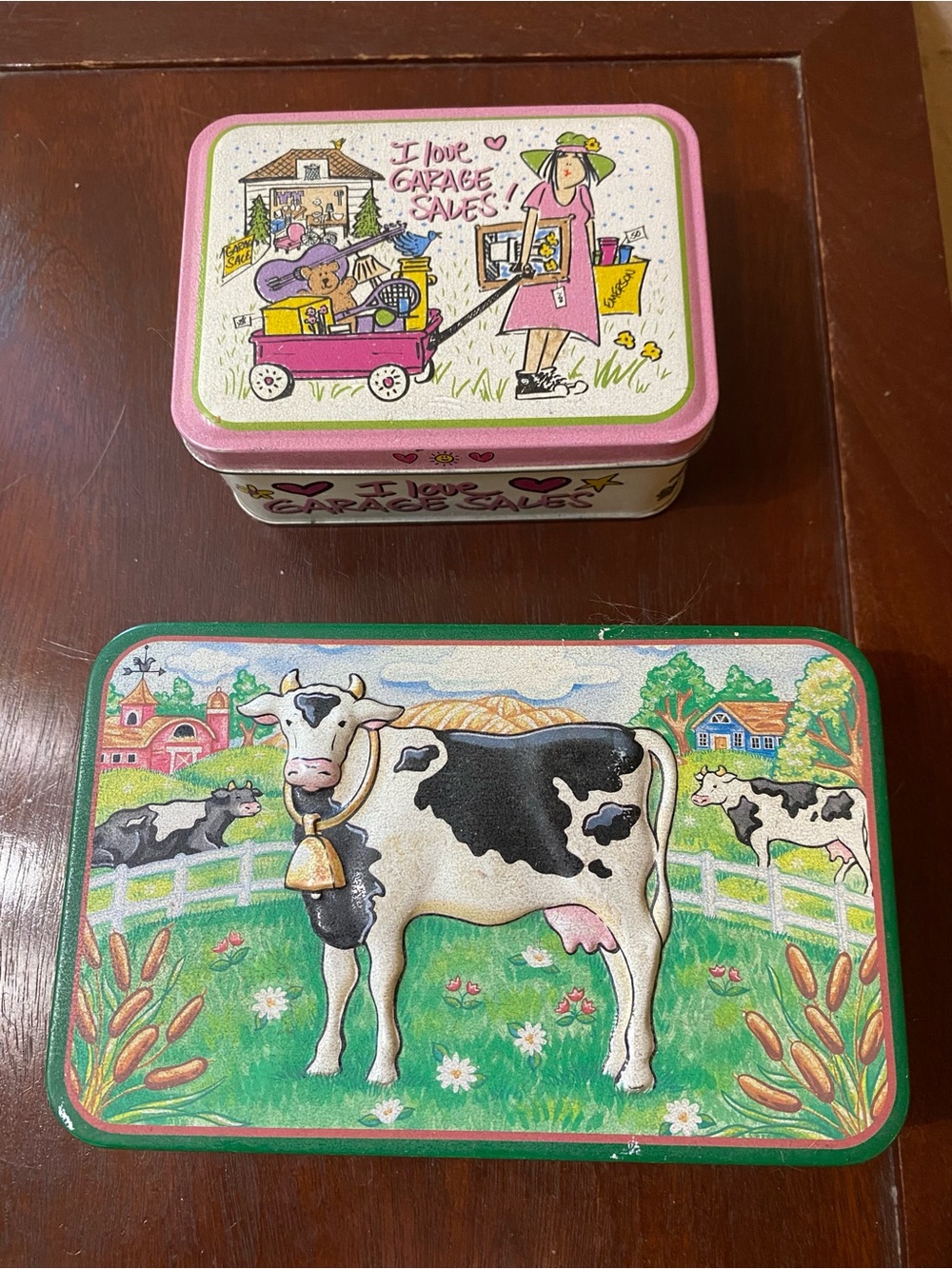 Two vintage tin containers